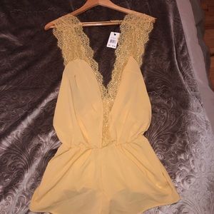 Yellow sheer/lace plunge romper- ASOS Size M